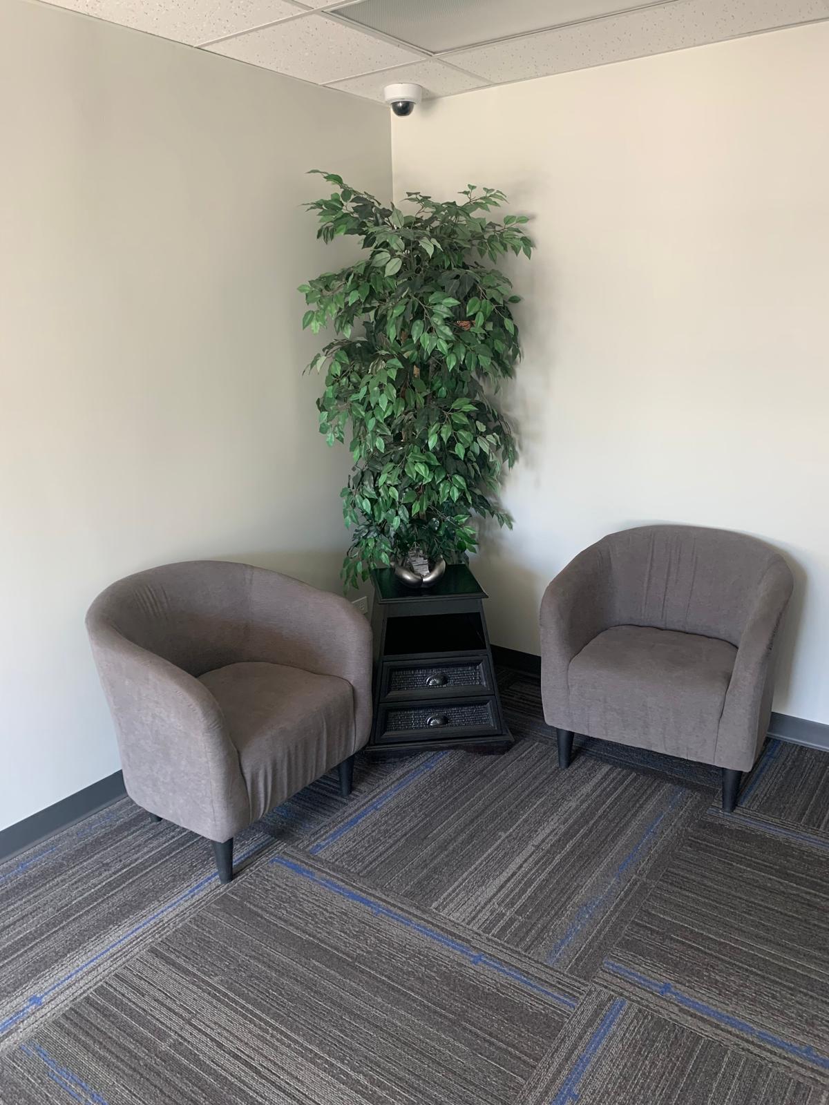 Clean office corner seating area